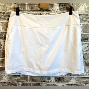 Adidas skort. Size L. White. Pockets. Shorts underneath.